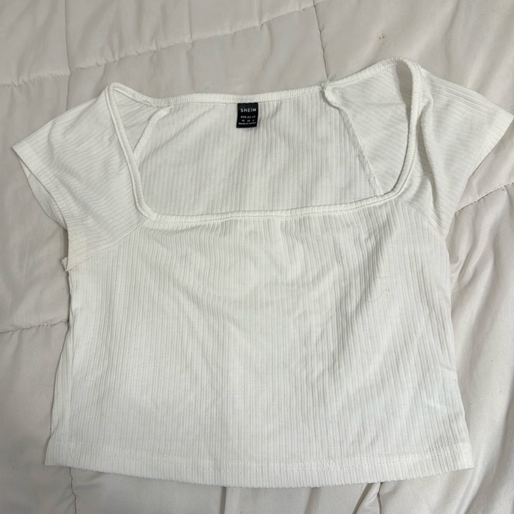 White cropped short sleeve square neck.